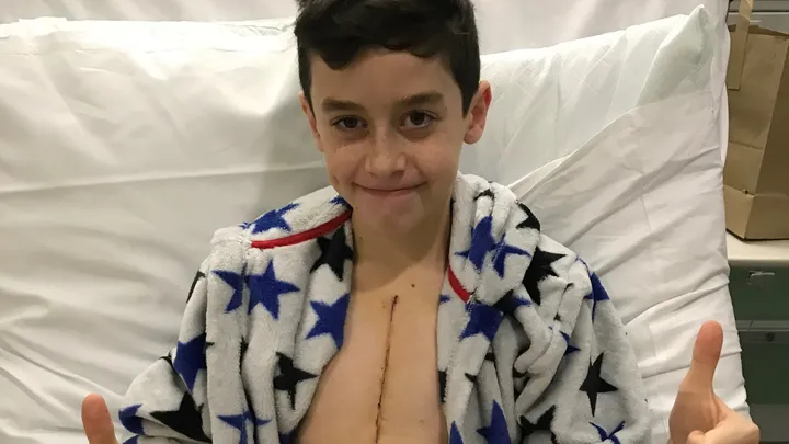 Fin smiling and giving a thumbs up